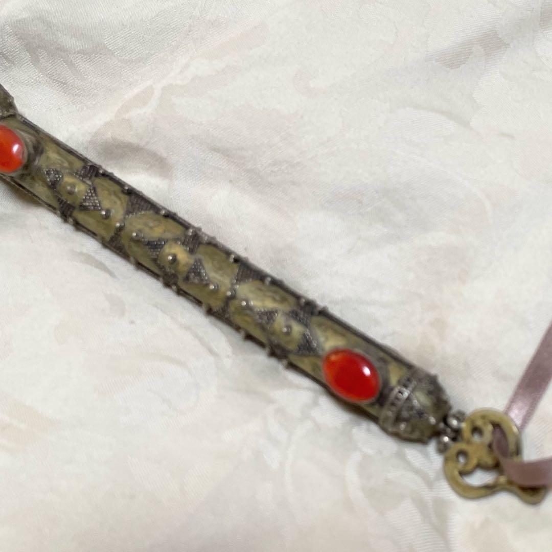 トルクメニスタン トルクメン 装飾品 経典などを指す道具